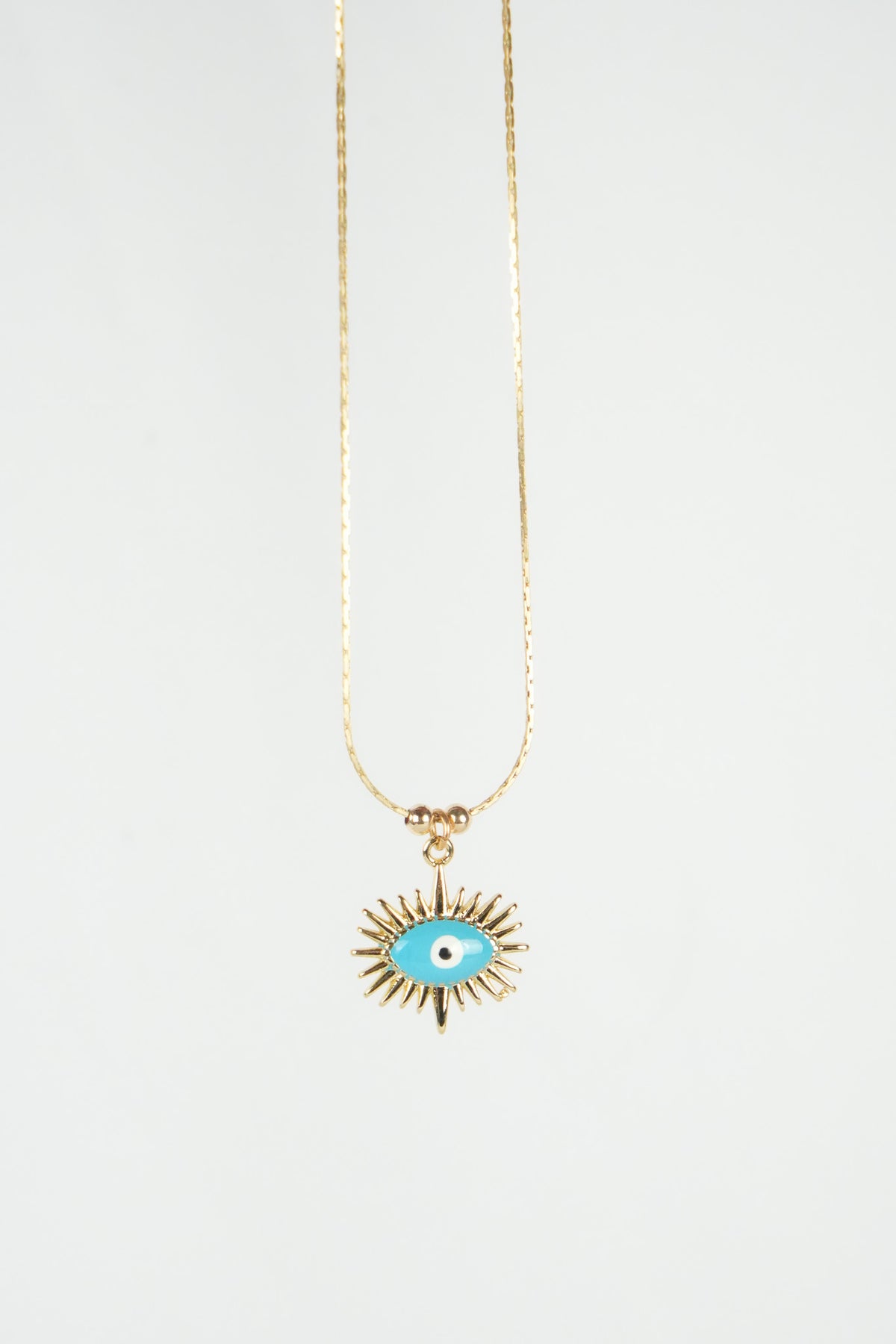 Despertar - Collar con dije de tercer ojo azul