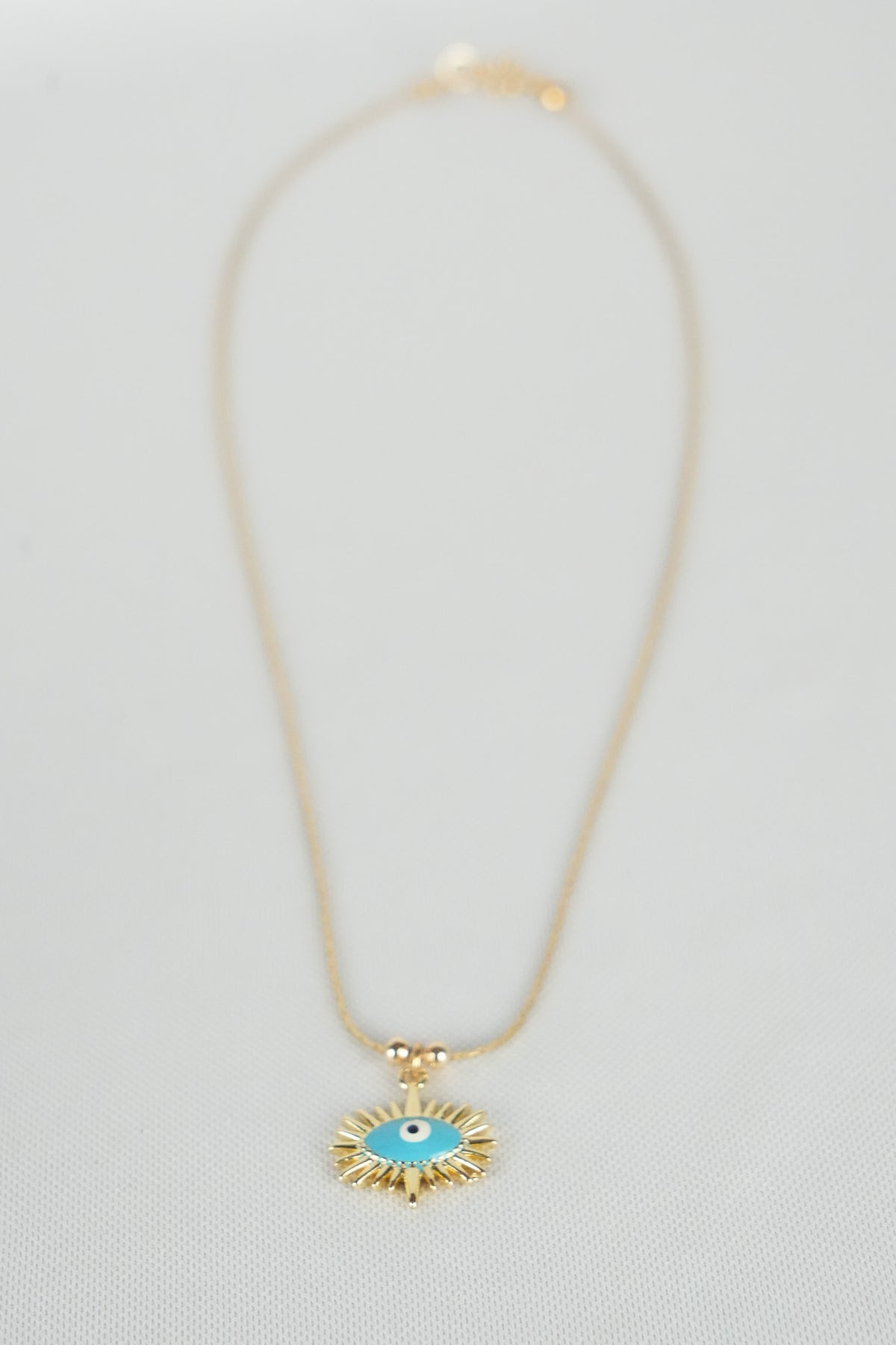 Despertar - Collar con dije de tercer ojo azul