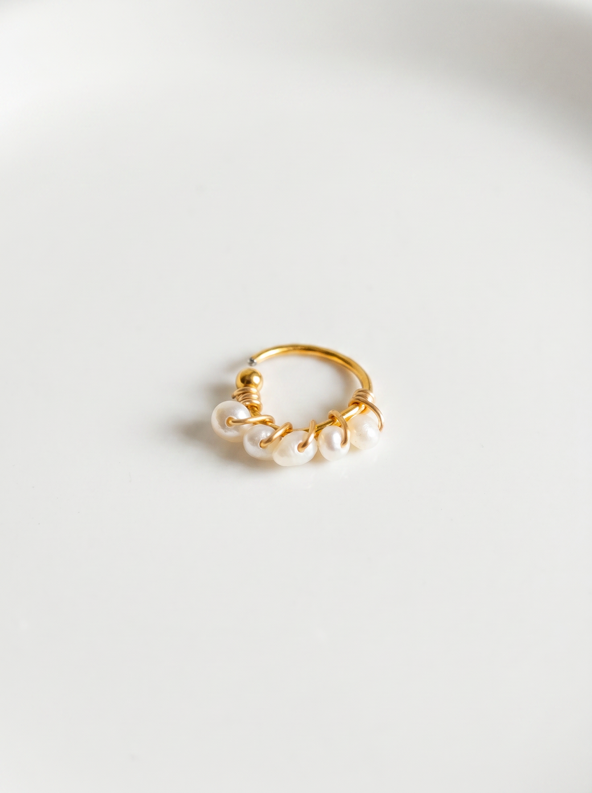 Sello de Perla | Piercing con piedras aperladas